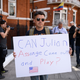 An American man protests against the actions of Wikileaks and Julian Assange outside the Ecuadorian embassy on July 30, 2018 in London, England